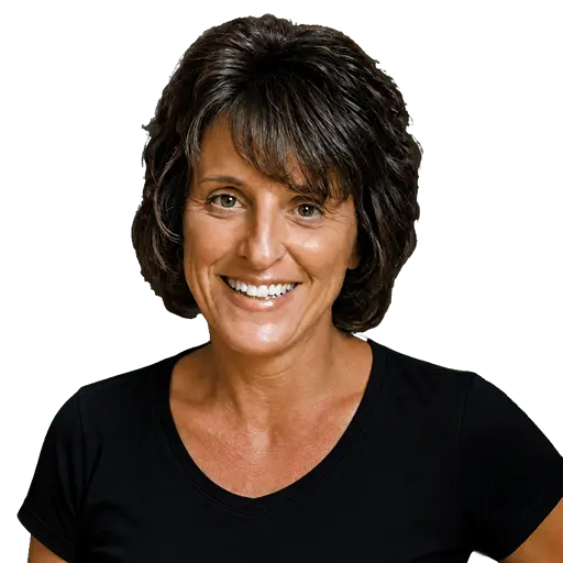 Smiling woman with short dark hair wearing a black top, facing the camera against a solid green background.